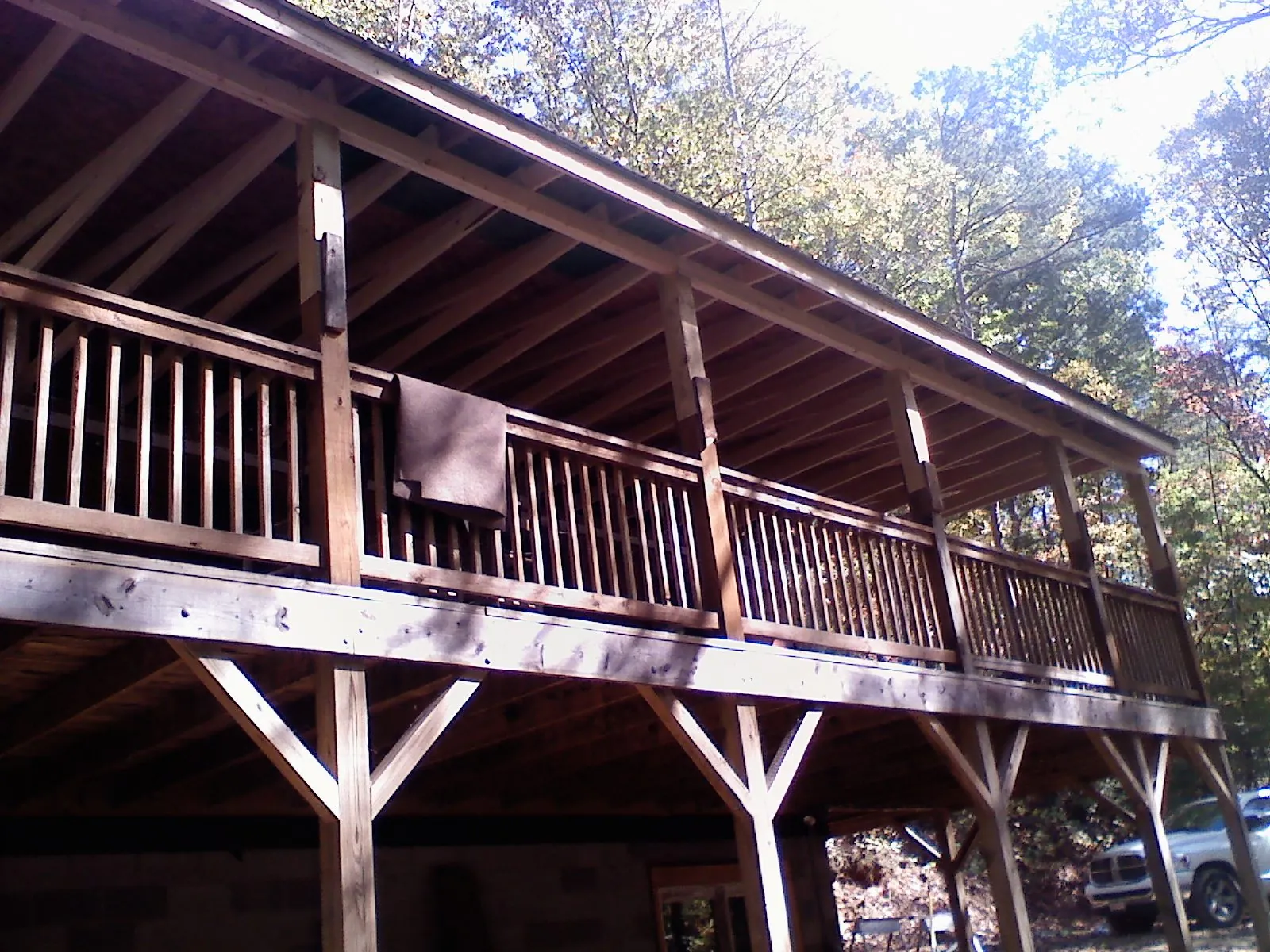 Timber framing under a new elevated porch and deck — Roof Leak Repair in Ashburn by Roofing Brothers